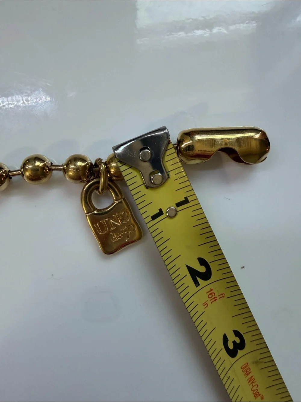 UNO de 50 Gold-Tone Beaded Bracelet with Padlock Charm